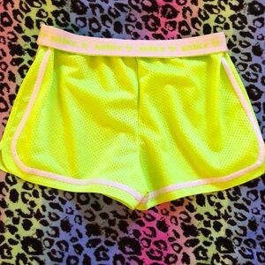 Justice neon green mesh shorts in size 16💚
